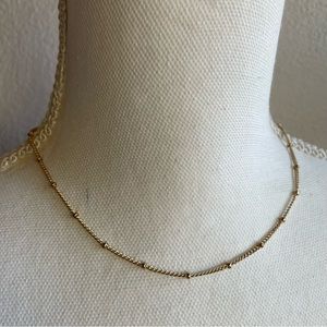Dainty gold tone necklace